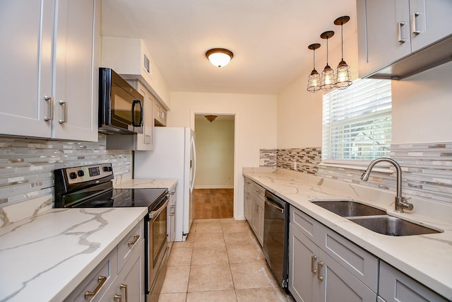 500 N Post Oak Ln, Houston, TX 77024 - kitchen with stainless steel electric stove, black microwave, a sink, dishwasher, and tasteful backsplash