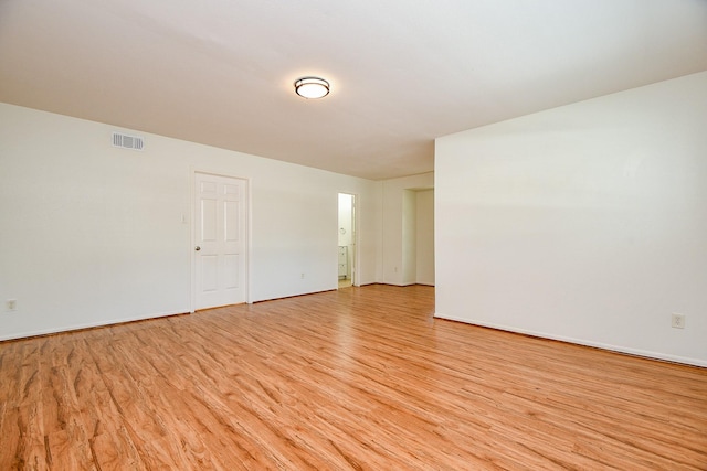 500 N Post Oak Ln, Houston, TX 77024 - unfurnished room featuring light wood-type flooring and baseboards