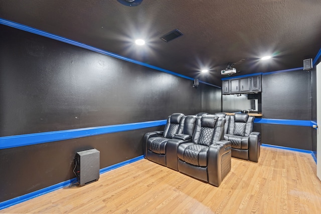 22338 Prince George St, Katy, TX 77449 - home theater with wood finished floors, baseboards, recessed lighting, and crown molding