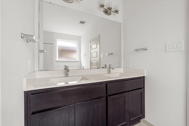 bathroom with double vanity