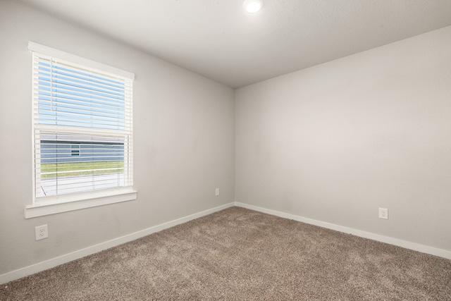 7438 Victoria Brook Trce, Richmond, TX 77407 - carpeted spare room featuring baseboards and recessed lighting