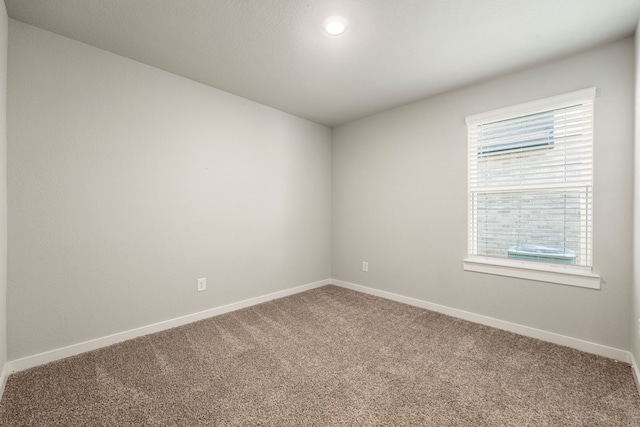 7438 Victoria Brook Trce, Richmond, TX 77407 - carpeted spare room with baseboards and recessed lighting