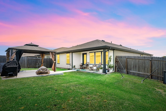 7438 Victoria Brook Trce, Richmond, TX 77407 - back of house featuring a patio area and a gazebo