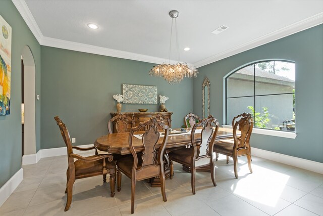 28842 Lakeside Grn, Magnolia, TX 77355 - dining room with crown molding, healthy amount of natural light, a chandelier, baseboards, and recessed lighting
