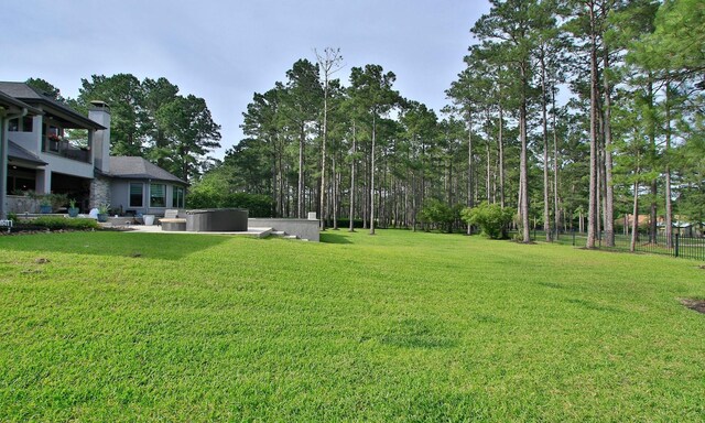 28842 Lakeside Grn, Magnolia, TX 77355 - view of yard with a hot tub and a patio