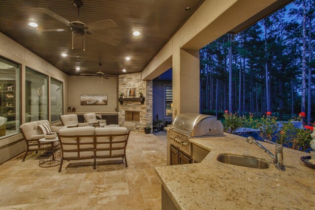 28842 Lakeside Grn, Magnolia, TX 77355 - view of patio / terrace featuring a sink, an outdoor hangout area, and ceiling fan