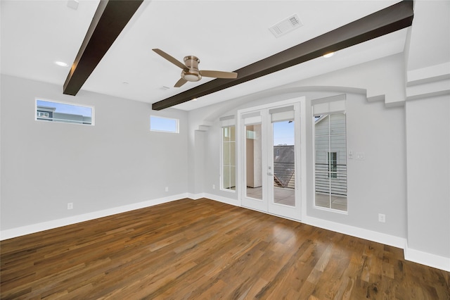 1215 W 23rd St, Houston, TX 77008 - spare room with beamed ceiling, a ceiling fan, baseboards, wood finished floors, and french doors