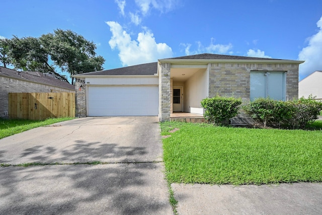 7735 Quail Meadow Dr, Houston, TX 77071 - view of front of home with an attached garage and driveway