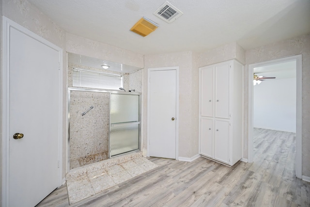 7735 Quail Meadow Dr, Houston, TX 77071 - full bathroom featuring a shower stall and wood finished floors