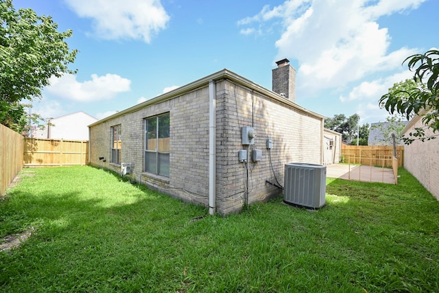 7735 Quail Meadow Dr, Houston, TX 77071 - rear view of house featuring a chimney, a fenced backyard, and a patio