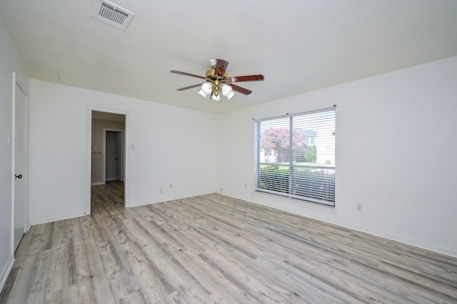 7735 Quail Meadow Dr, Houston, TX 77071 - empty room featuring light wood-style floors and a ceiling fan