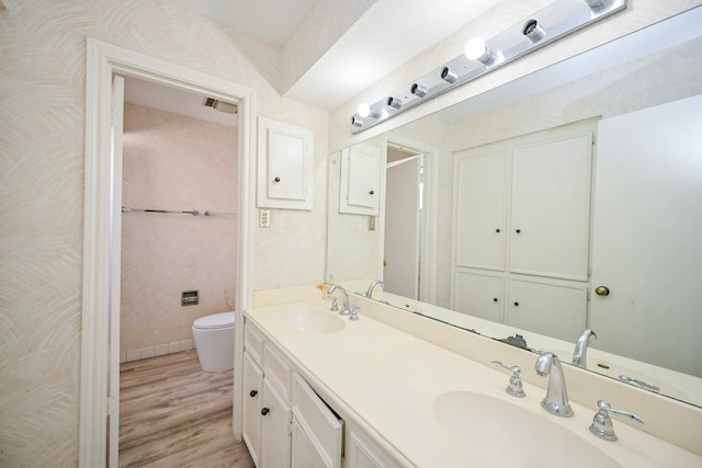 7735 Quail Meadow Dr, Houston, TX 77071 - full bathroom with wood finished floors and double vanity