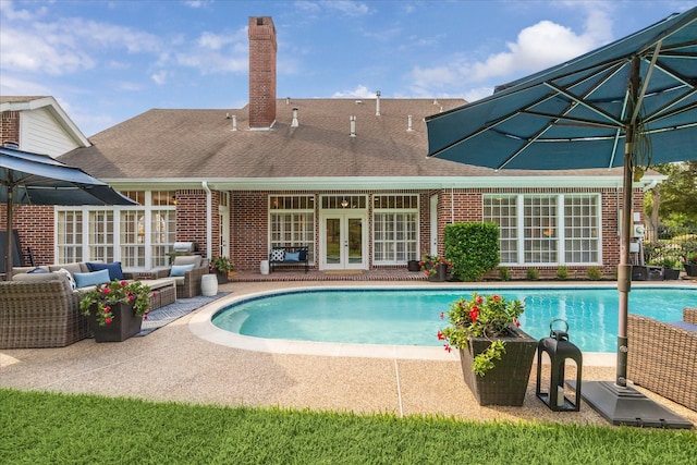 51 Dartmoor Ct, Sugar Land, TX 77479 - swimming pool featuring french doors and a patio area