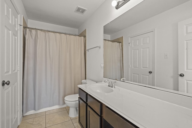 bathroom featuring vanity, toilet, and a shower with shower curtain