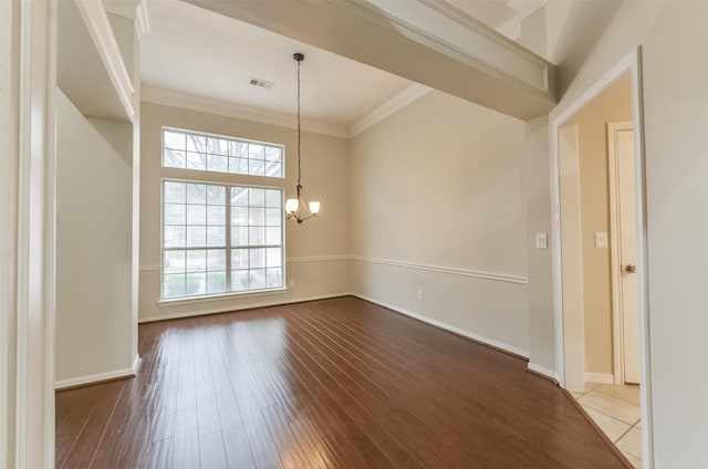 12950 Quail Park Dr, Cypress, TX 77429 - empty room featuring a chandelier, dark wood-style floors, ornamental molding, and baseboards