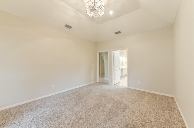 12950 Quail Park Dr, Cypress, TX 77429 - unfurnished room with light colored carpet, a chandelier, and baseboards