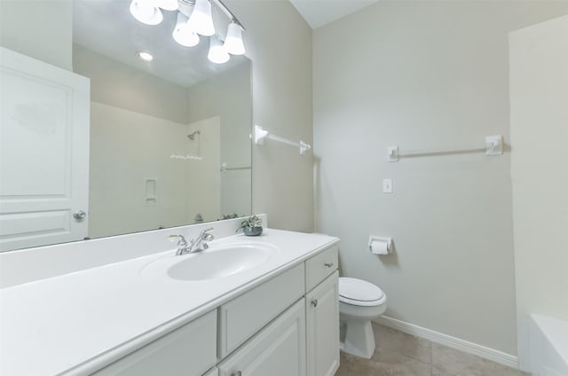 12950 Quail Park Dr, Cypress, TX 77429 - full bathroom with toilet, baseboards, vanity, and tile patterned floors