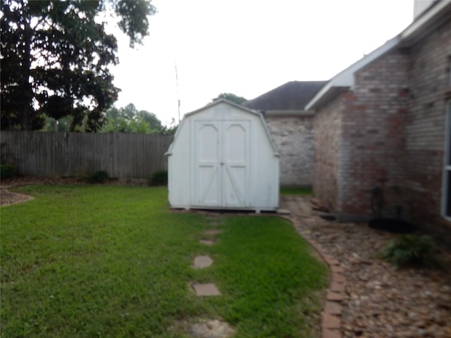 12950 Quail Park Dr, Cypress, TX 77429 - view of yard featuring a storage shed and an outbuilding