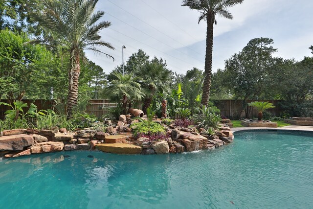 12923 Hunterfield Dr, Cypress, TX 77429 - view of swimming pool featuring a fenced backyard