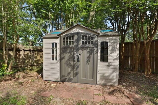 12923 Hunterfield Dr, Cypress, TX 77429 - view of shed featuring a fenced backyard