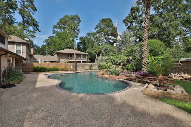 12923 Hunterfield Dr, Cypress, TX 77429 - view of swimming pool with a patio area and a fenced backyard