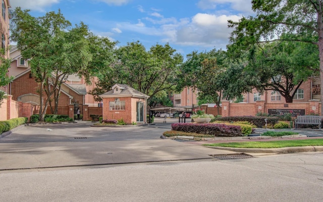 2111 Welch St Unit A110, Houston, TX 77019 - view of front of house with a gate and brick siding