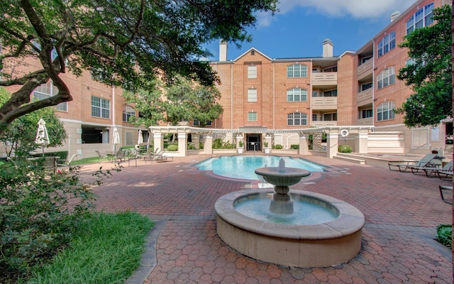 2111 Welch St Unit A110, Houston, TX 77019 - view of swimming pool featuring a patio area