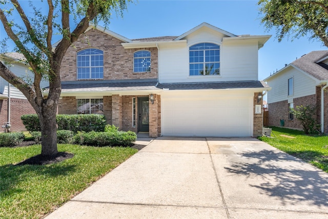 11818 Remington Run Ln, Houston, TX 77066 - traditional-style home with brick siding, concrete driveway, an attached garage, and a front lawn