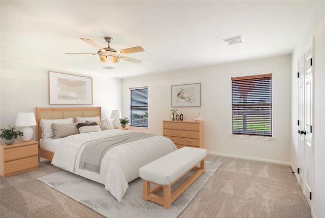 11818 Remington Run Ln, Houston, TX 77066 - bedroom featuring light colored carpet, baseboards, and ceiling fan