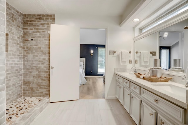 6202 Arcadian Shores Dr, Houston, TX 77084 - full bath with ensuite bath, a tile shower, and double vanity