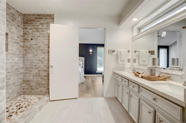 6202 Arcadian Shores Dr, Houston, TX 77084 - ensuite bathroom featuring double vanity and plenty of natural light