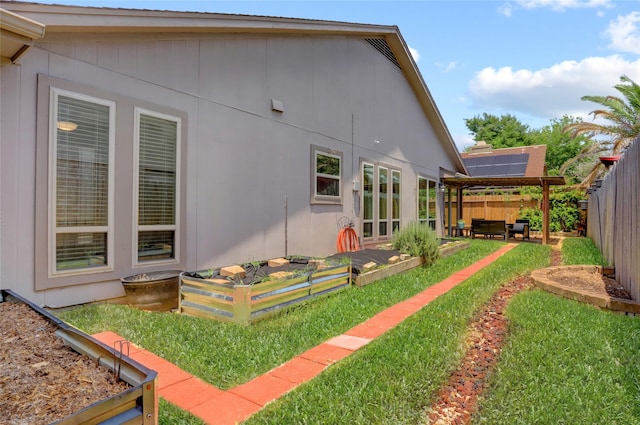 6202 Arcadian Shores Dr, Houston, TX 77084 - view of side of home with a fenced backyard, a patio, and french doors