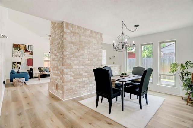 6202 Arcadian Shores Dr, Houston, TX 77084 - dining room with light wood-style flooring and a chandelier