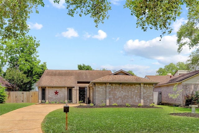 6202 Arcadian Shores Dr, Houston, TX 77084 - mid-century home with brick siding and roof with shingles