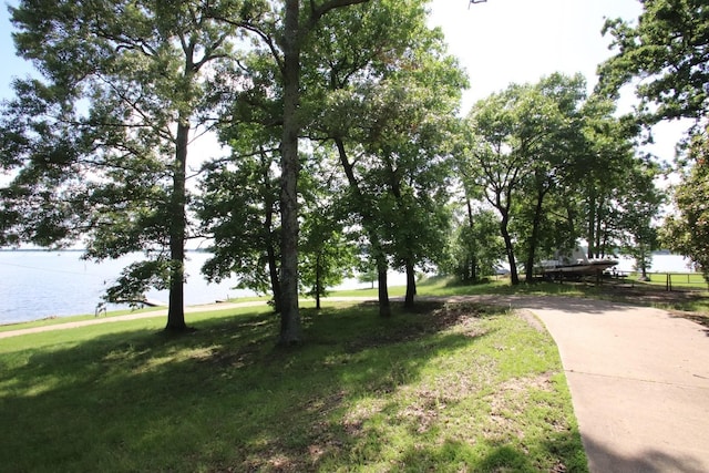 606 County Road 1947, Yantis, TX 75497 - view of green lawn with a water view