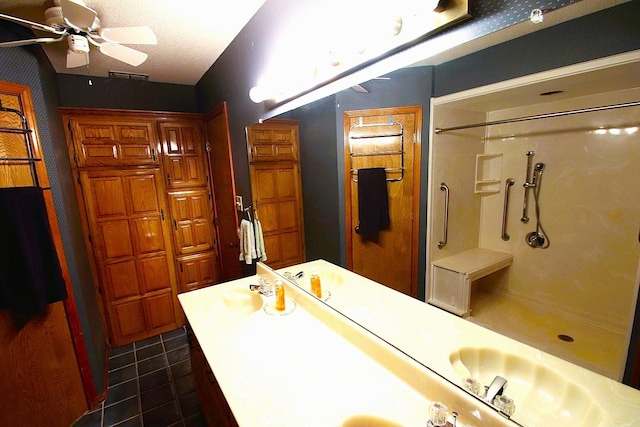 606 County Road 1947, Yantis, TX 75497 - bathroom with a shower, ceiling fan, tile patterned floors, and vanity
