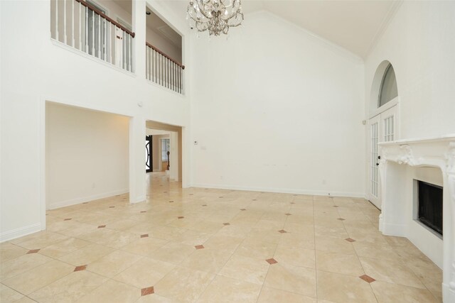 4603 Joyce Blvd, Houston, TX 77084 - unfurnished living room featuring high vaulted ceiling, a chandelier, a fireplace, light tile patterned floors, and ornamental molding