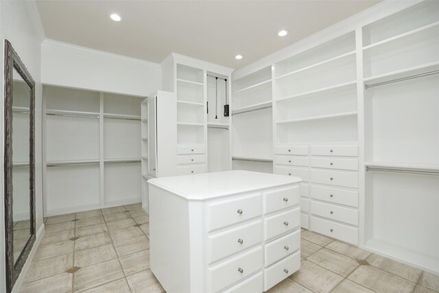 4603 Joyce Blvd, Houston, TX 77084 - walk in closet featuring light tile patterned flooring
