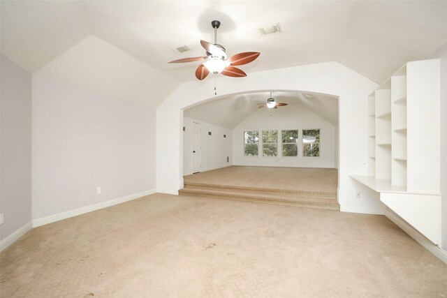 4603 Joyce Blvd, Houston, TX 77084 - bonus room featuring ceiling fan, light carpet, vaulted ceiling, baseboards, and built in features