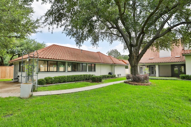 4603 Joyce Blvd, Houston, TX 77084 - view of front facade featuring a tiled roof and stucco siding