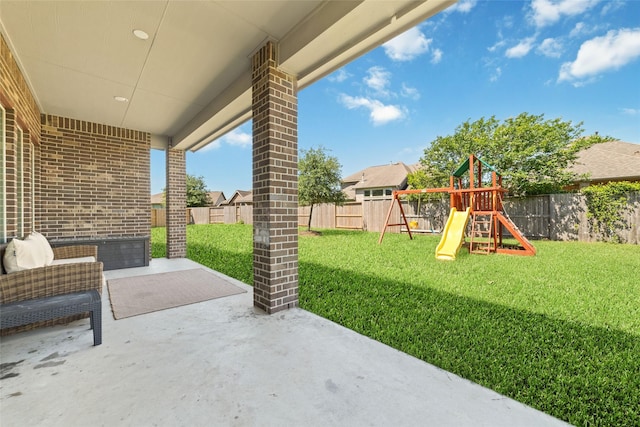 view of patio with a playground