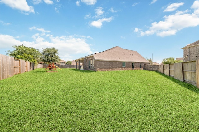 view of yard featuring a playground