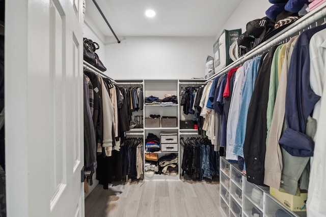 spacious closet featuring wood finished floors