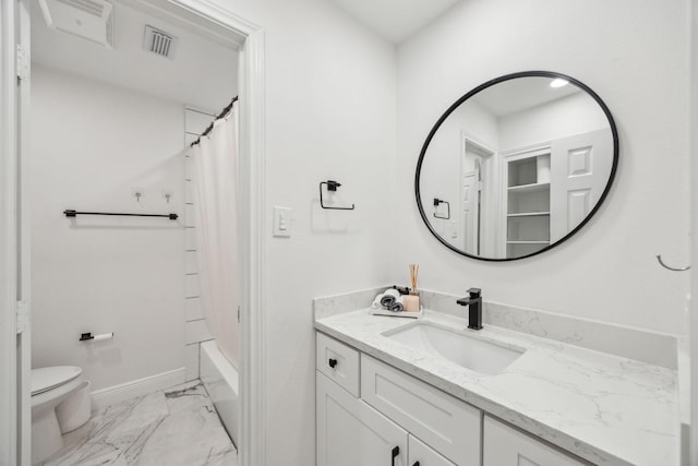 full bathroom with marble look tiles, toilet, vanity, baseboards, and shower / bath combo with shower curtain