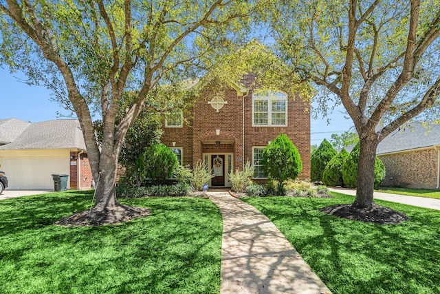 11018 Jadestone Creek Ln, Cypress, TX 77433 - traditional home featuring brick siding and a front lawn
