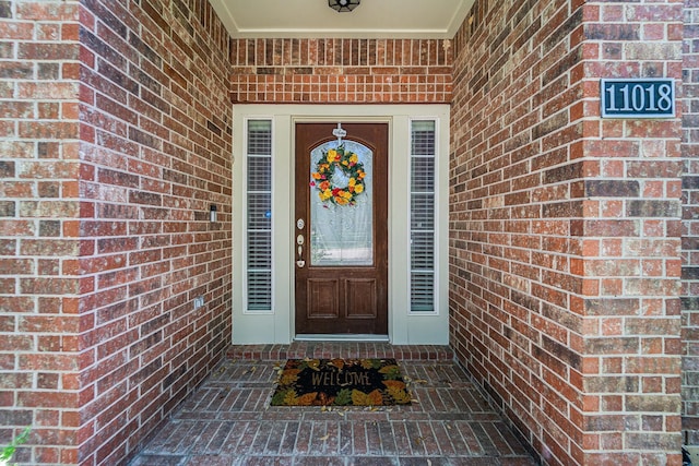 11018 Jadestone Creek Ln, Cypress, TX 77433 - doorway to property featuring brick siding