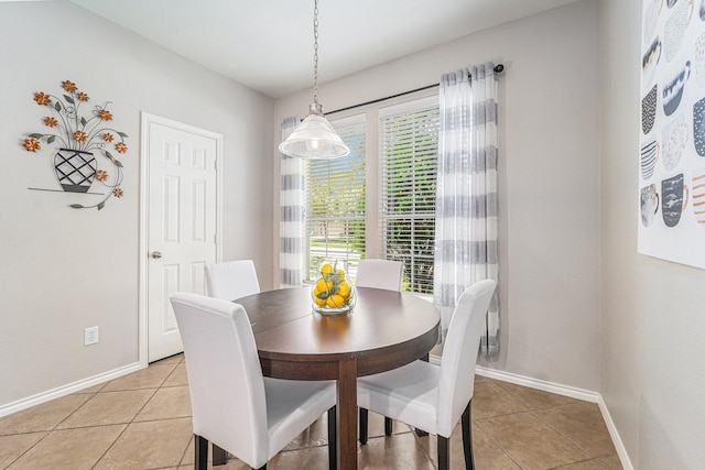 11018 Jadestone Creek Ln, Cypress, TX 77433 - dining room featuring light tile patterned floors and baseboards