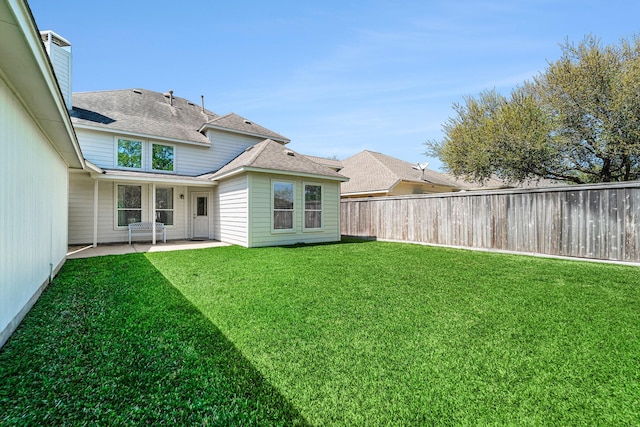 11018 Jadestone Creek Ln, Cypress, TX 77433 - rear view of house featuring a patio and roof with shingles