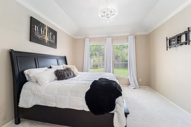 11018 Jadestone Creek Ln, Cypress, TX 77433 - bedroom with carpet floors, a chandelier, baseboards, a tray ceiling, and crown molding