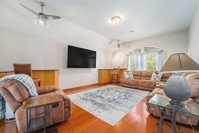 11018 Jadestone Creek Ln, Cypress, TX 77433 - living room with ceiling fan, wood finished floors, and vaulted ceiling
